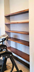 set of 5 custom floating shelves made of thick solid walnut wood made in Lancaster Pennsylvania by Zimboards