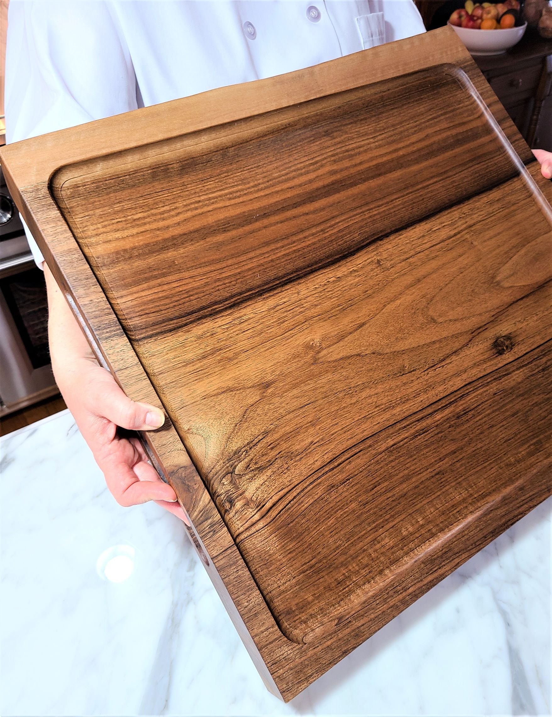 Extra large walnut carving board.  This solid wood cutting board also has a live edge.  Made in USA by ZimBoards. 