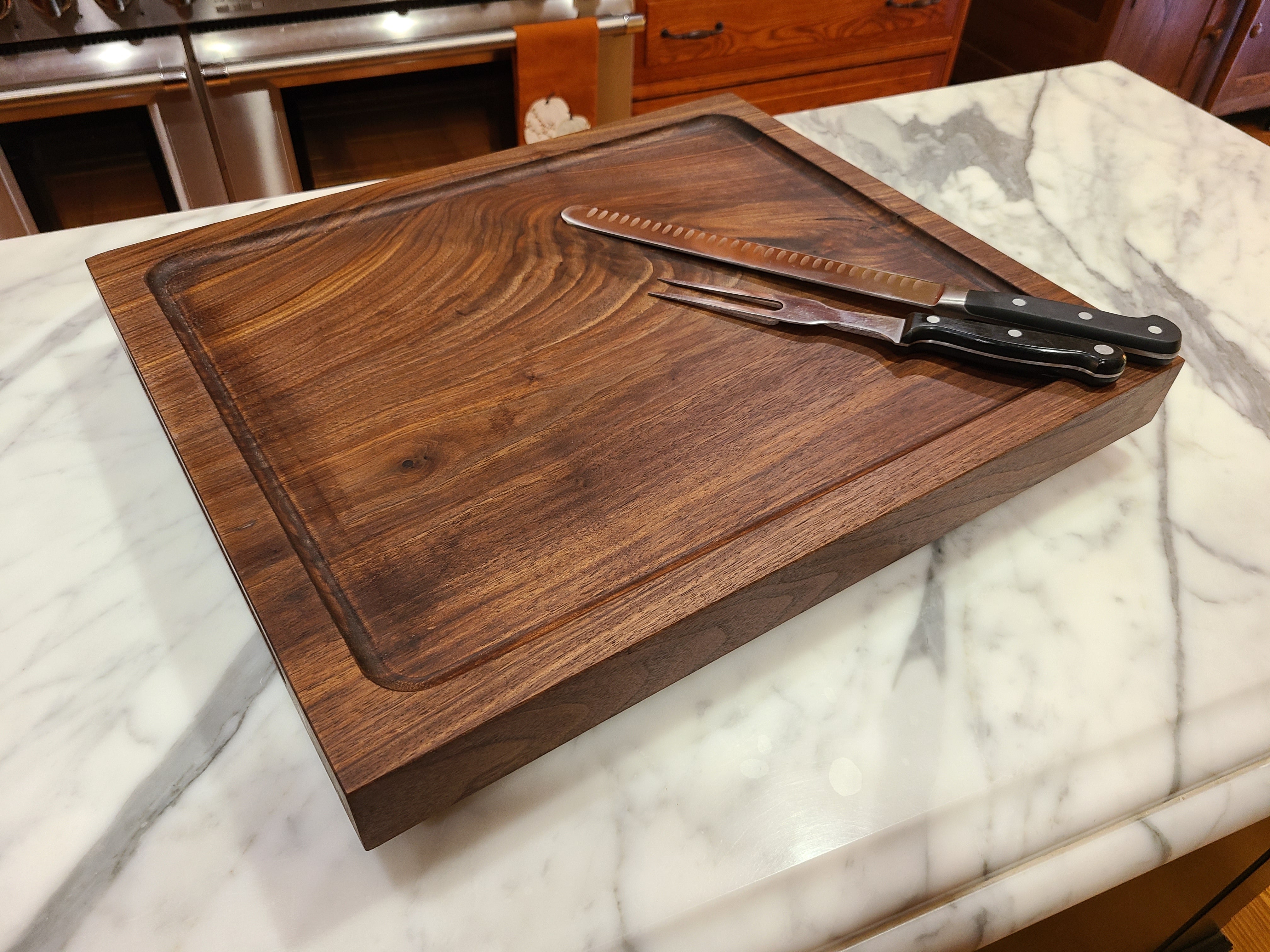walnut carving board with a routed juice pocket 