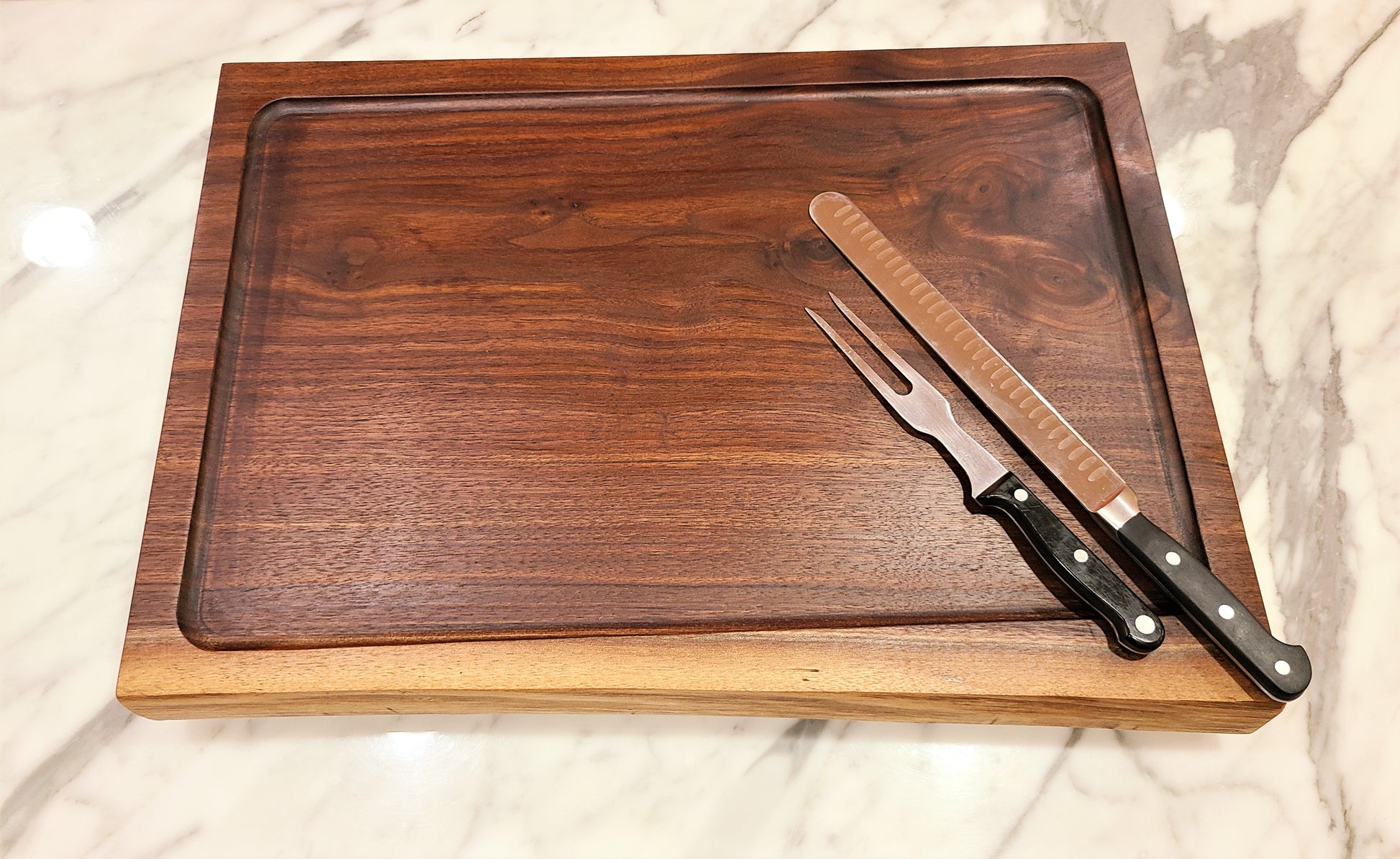 custom walnut cutting and carving board