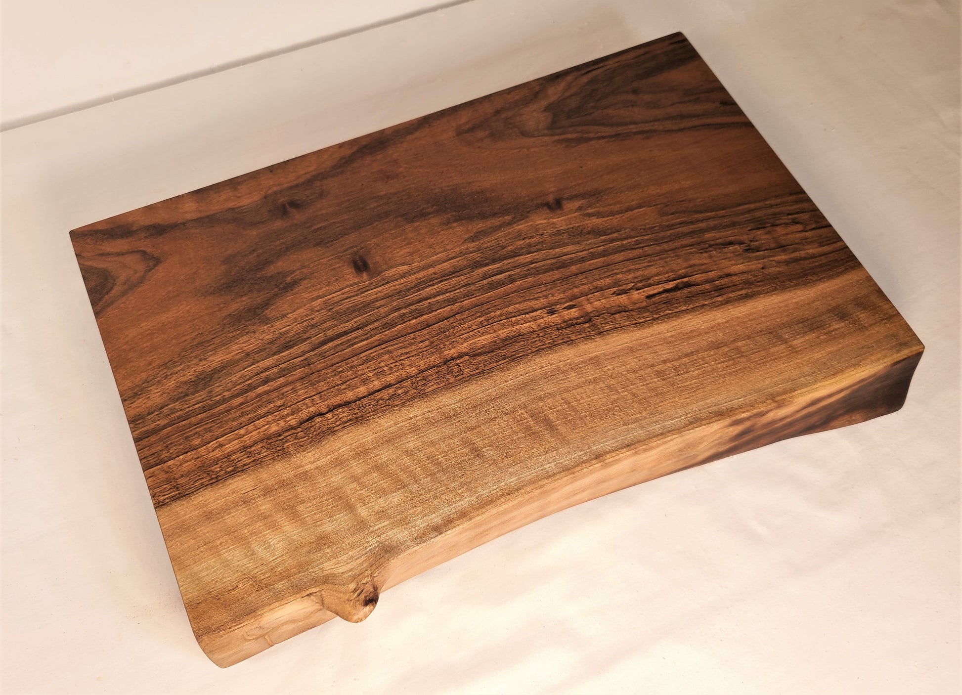small wood cutting board made of solid wood english walnut