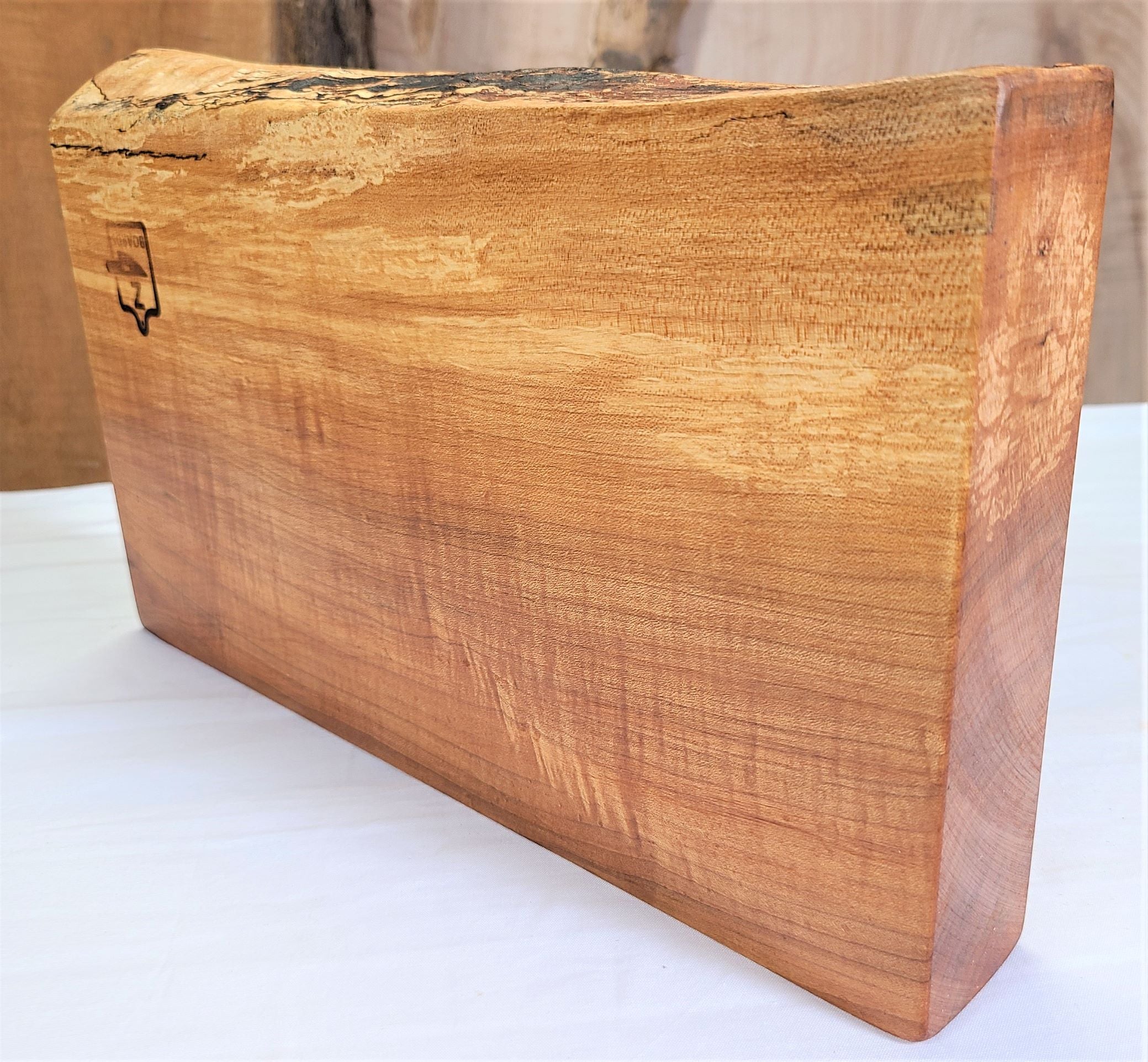 Live edge maple wood cutting board.  Thick solid wood built to handle everyday use and beautiful enough to use for serving and charcuterie.  Made in USA by ZimBoards