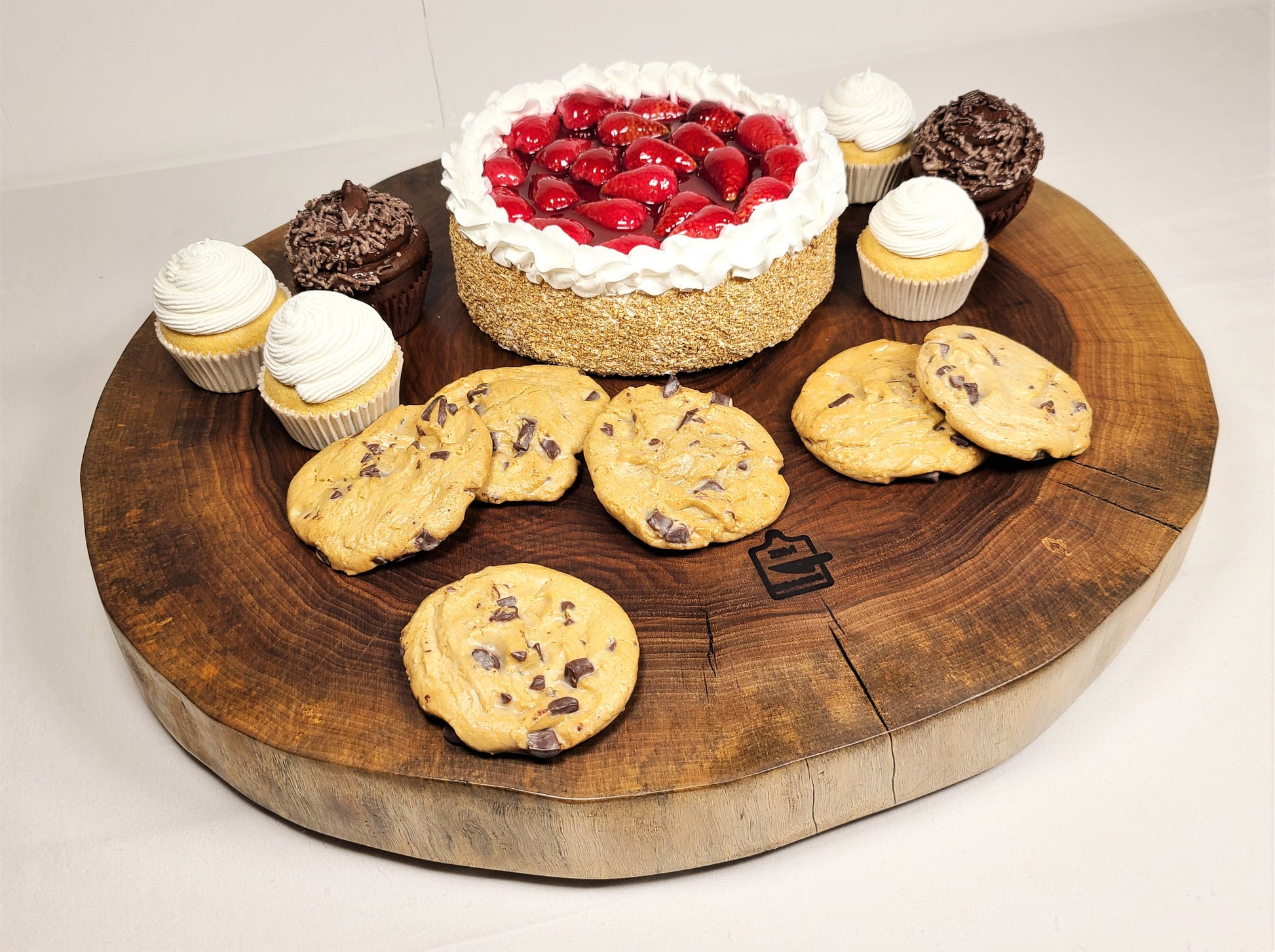 round walnut live edge wood cake stand.  Can also be used as a large charcuterie board