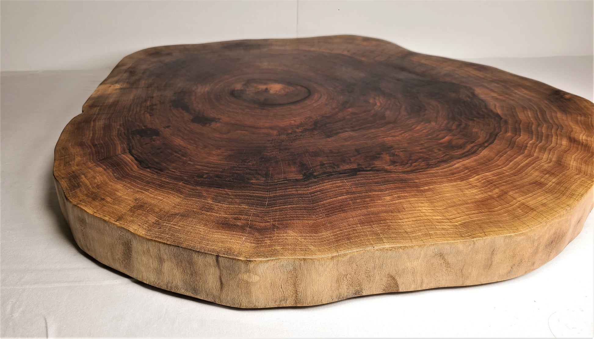 Round rustic charcuterie board. Live edge charcuterie board or wood cake stand