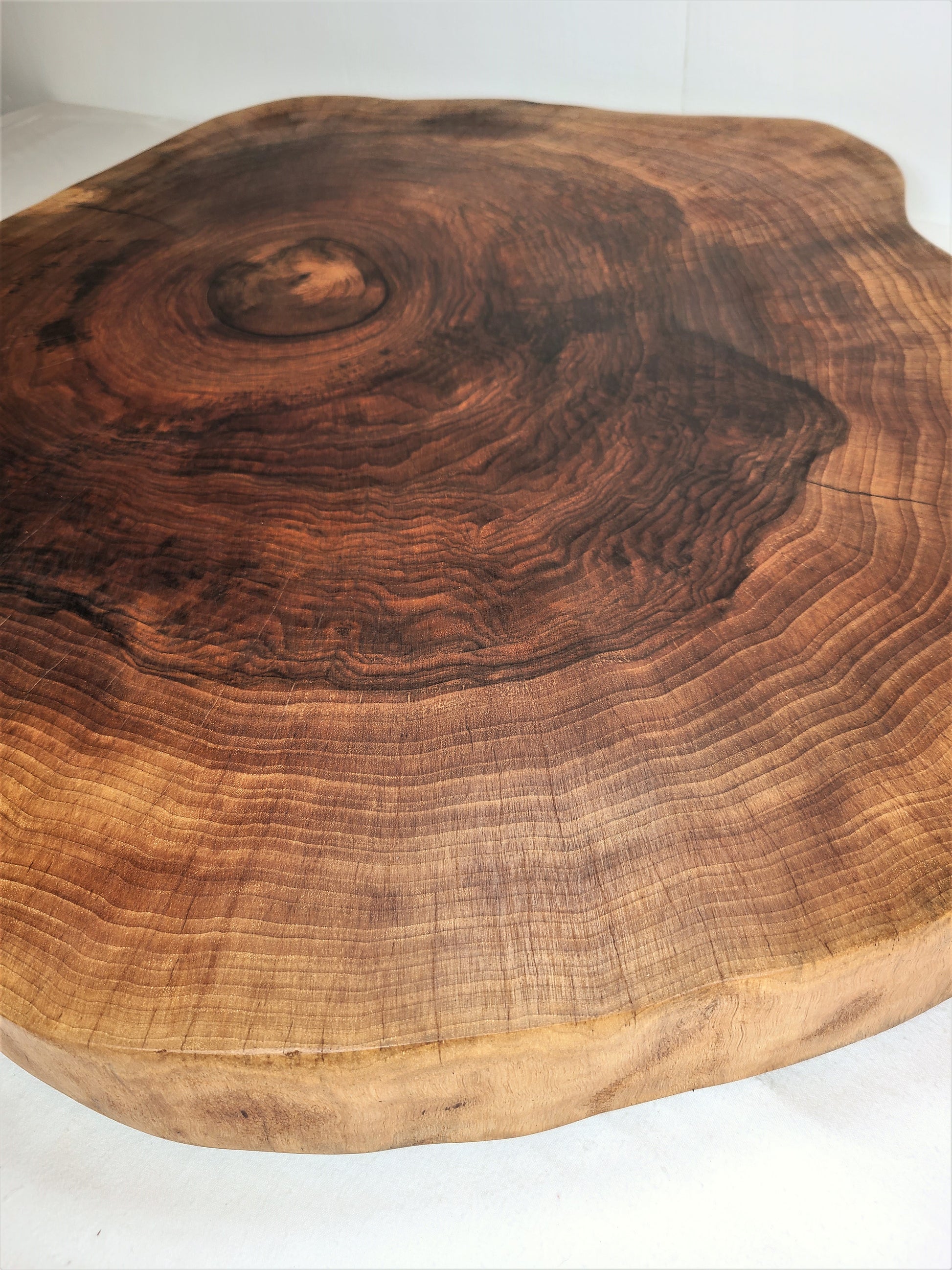 thick walnut large charcuterie board features a live edge