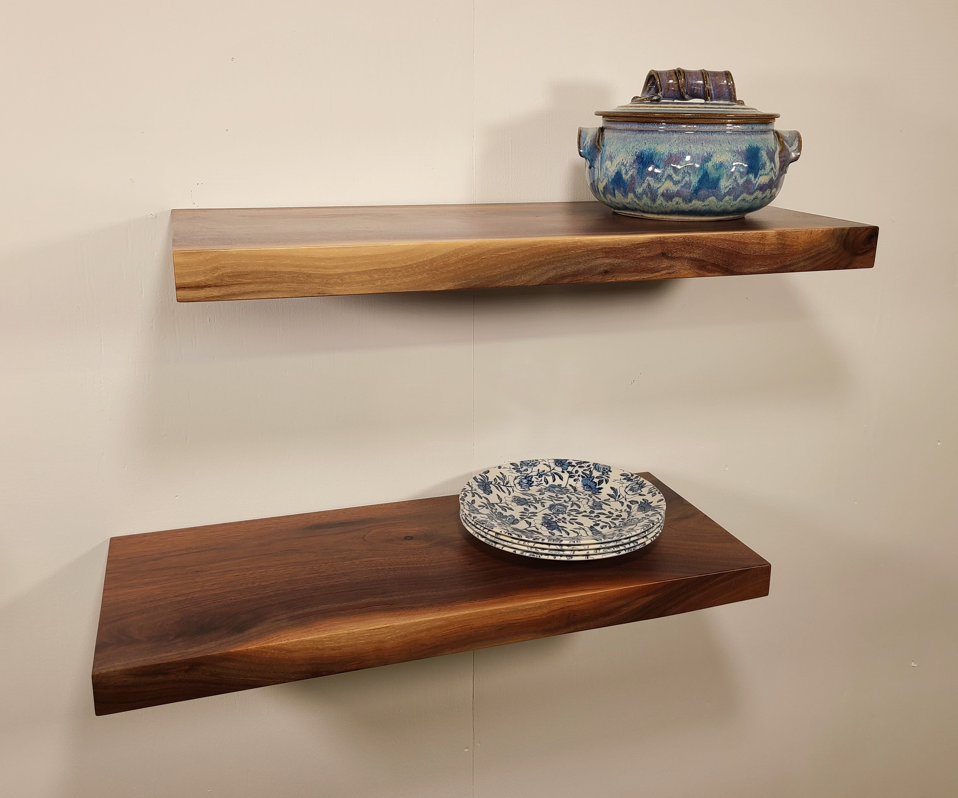 2 solid wood thick walnut floating shelves with a flat edge for a modern rustic look.  Made in Lancaster Pennsylvania by Zimboards.