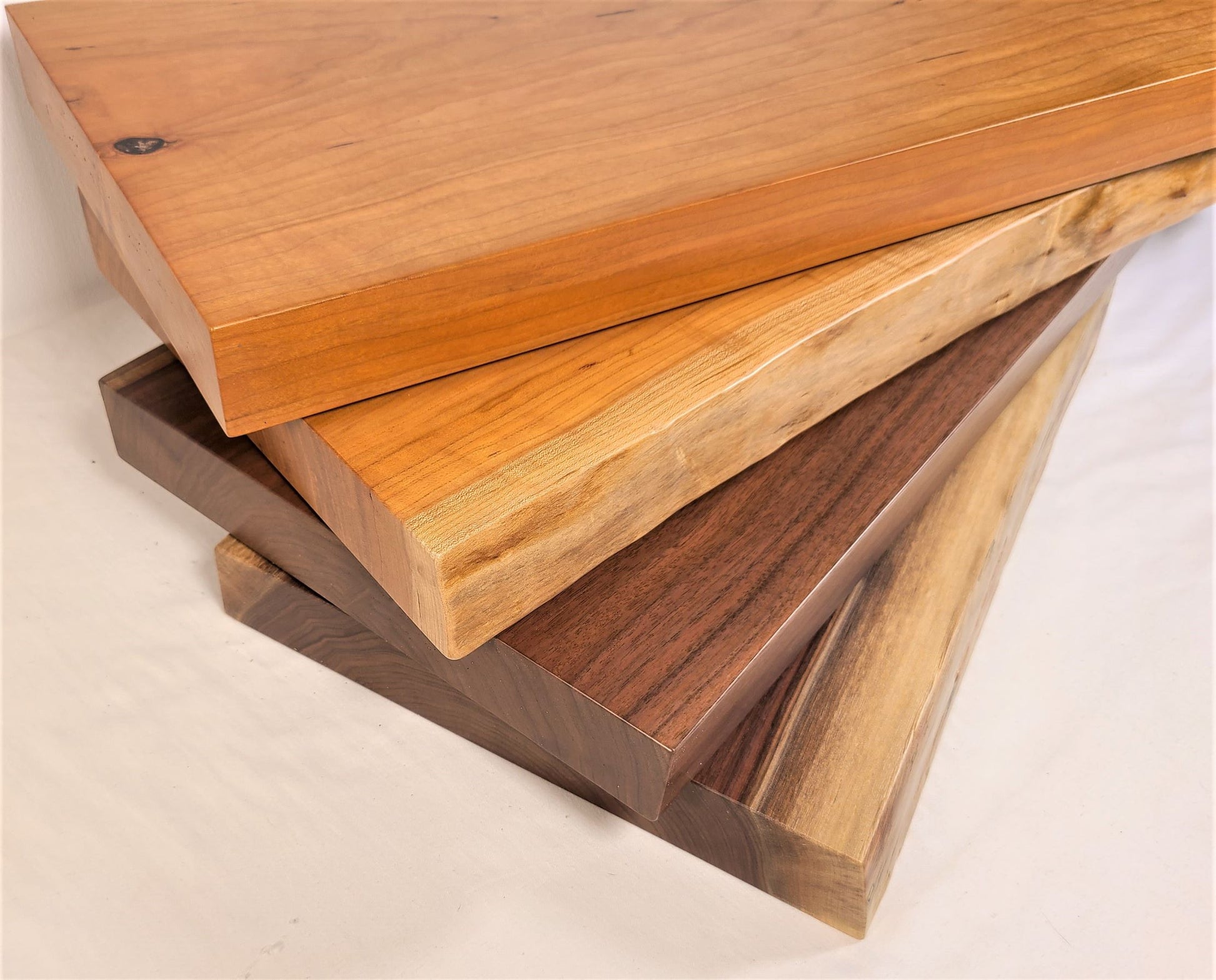 solid wood shelves available in walnut and cherry wood straight or live edge
