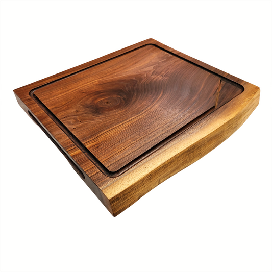 Beautiful live edge walnut carving board maple of  solid 2 inch thick featuring a juice groove on one side reversing to a flat surface on the other side can be used as a large charcuterie board can be personalized made by ZimBoards