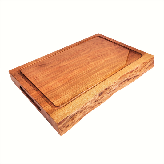 live edge carving board featuring a live edge and extra deep juice groove for less mess